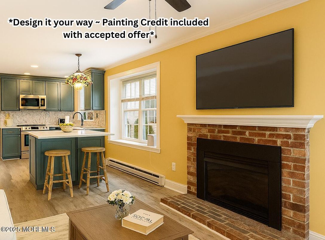 Fireplace, Interior, Kitchen, Pendant Lights, Recessed Lighting, Stainless Steel Appliances, Stone Walls, Wood Texture Flooring