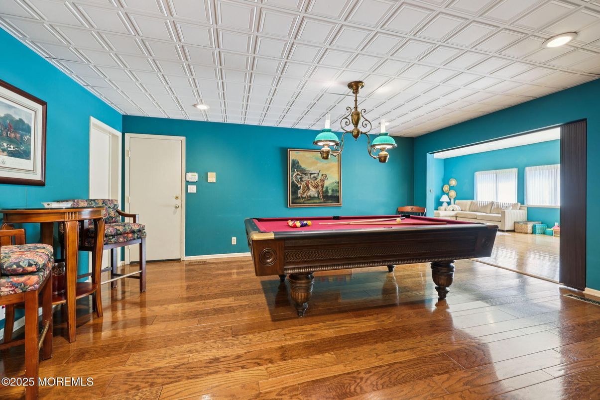 Billiard Table, Chandelier, Game Room, Interior, Pendant Lights, Wood Texture Flooring