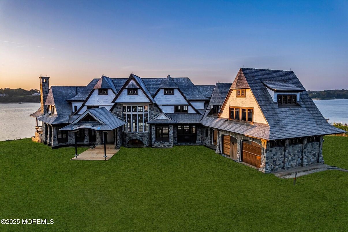 Attached, Backyard, Exterior, Facade, Water, Tudor Revival