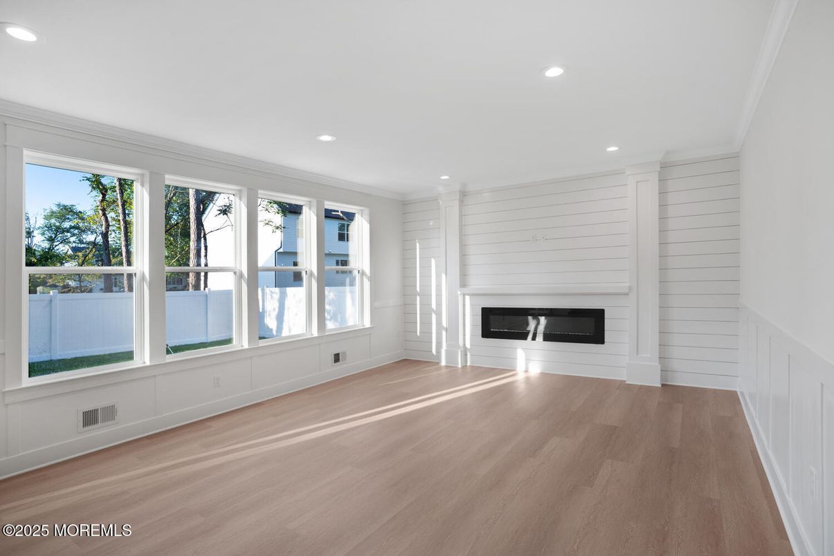 Empty room, Fireplace, Interior, Recessed Lighting, Wood Texture Flooring