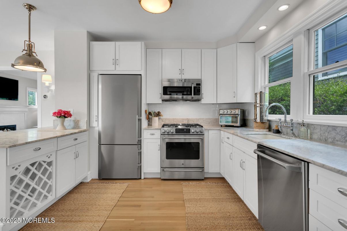 Interior, Kitchen, Pendant Lights, Recessed Lighting, Stainless Steel Appliances, Wood Texture Flooring