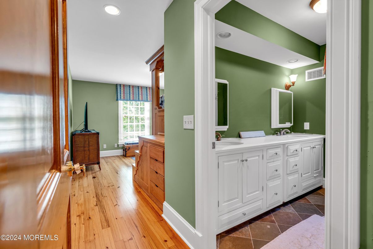 Bathroom, Dual Sink Vanities, Interior, Recessed Lighting, Wood Texture Flooring