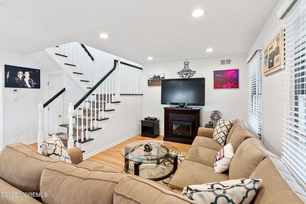 Fireplace, Interior, Living room, Recessed Lighting, Wood Texture Flooring