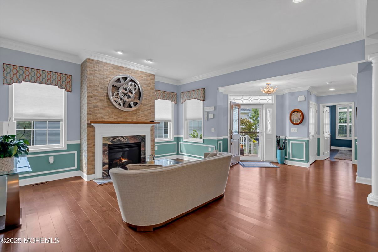 Fireplace, Interior, Living room, Recessed Lighting, Stone Walls, Wood Texture Flooring