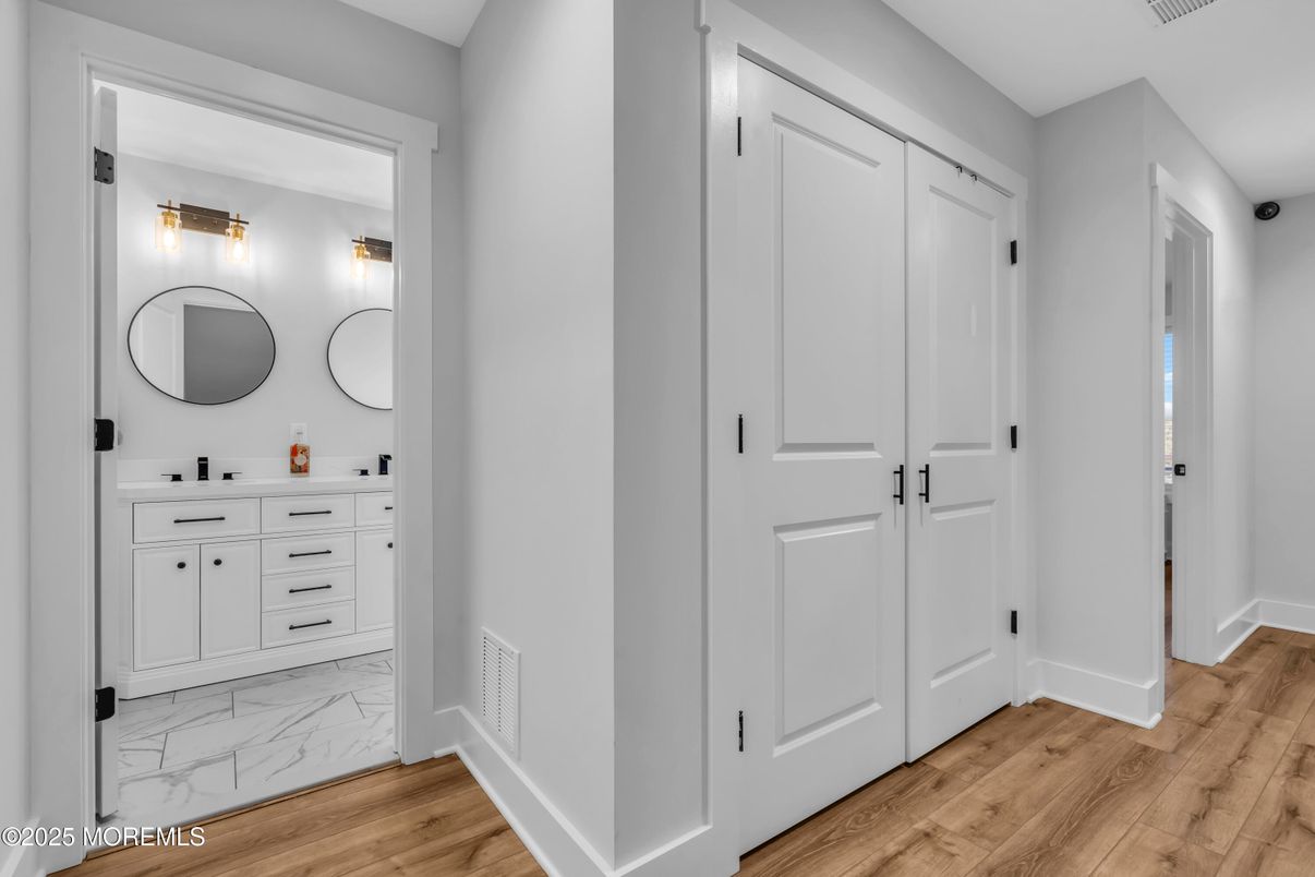 Bathroom, Dual Sink Vanities, Interior, Marble, Wood Texture Flooring