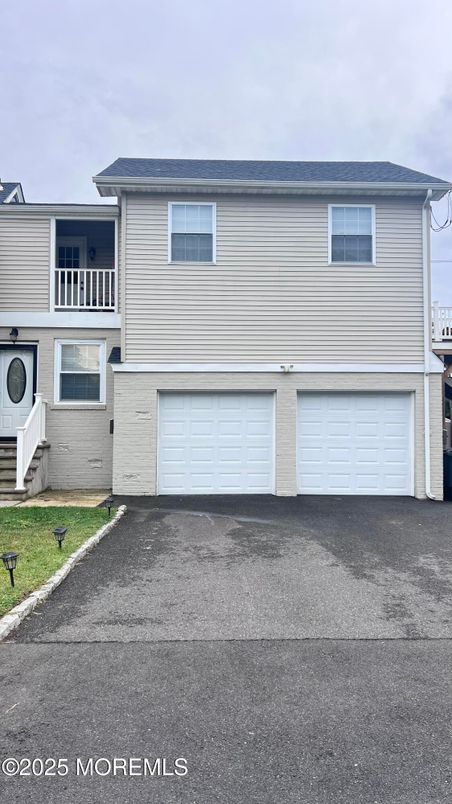 Attached, Exterior, Facade, Raised Ranch