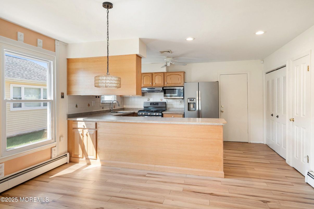 Interior, Kitchen, Pendant Lights, Recessed Lighting, Stainless Steel Appliances, Wood Texture Flooring