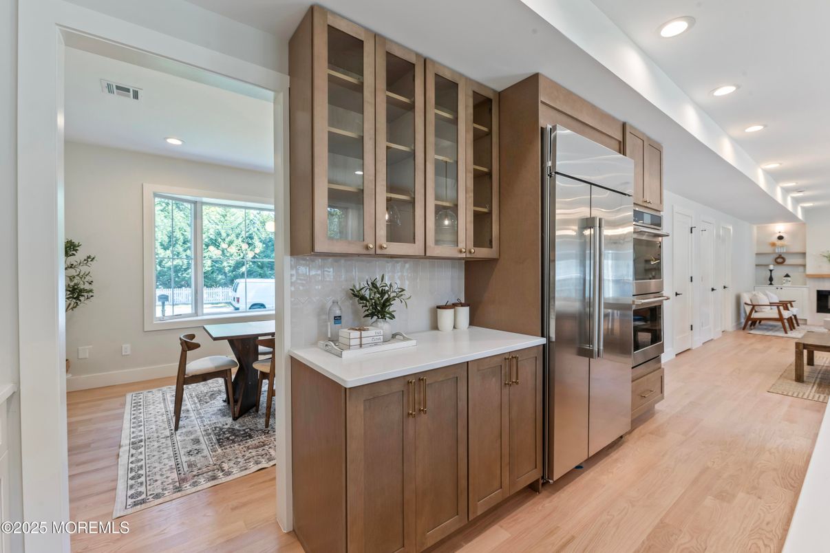 Dining room, Interior, Kitchen, Recessed Lighting, Stainless Steel Appliances, Wood Texture Flooring