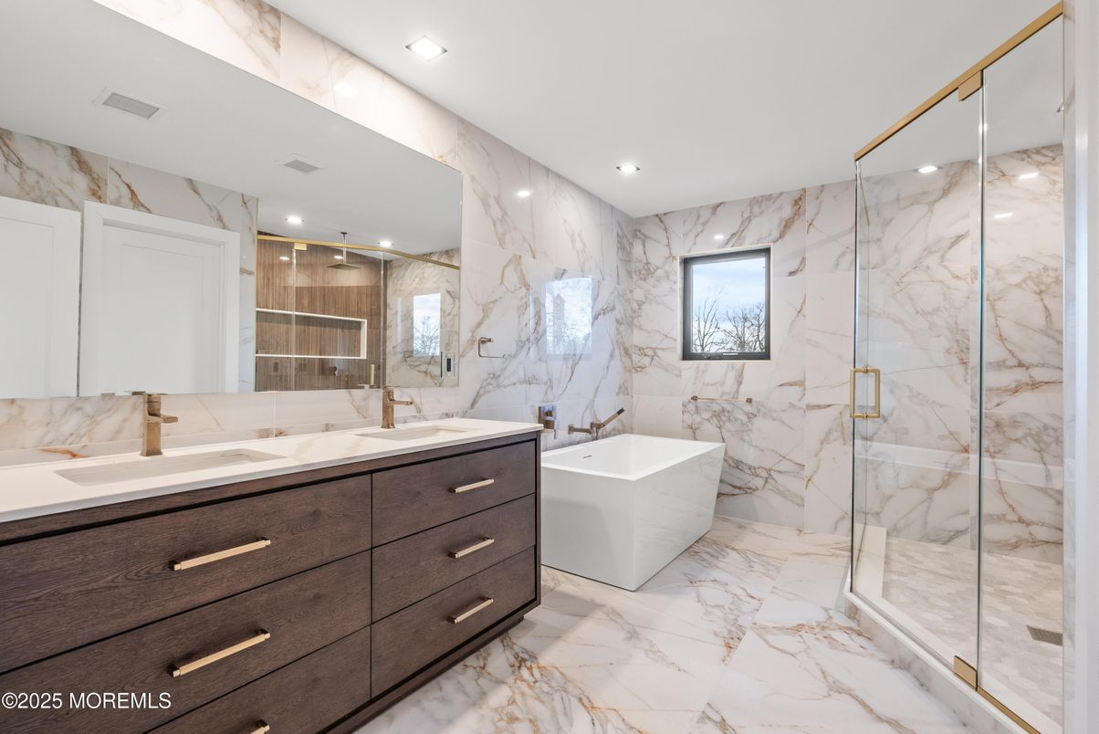 Bathroom, Dual Sink Vanities, Free Standing Baths, Glass Shower, Interior, Marble, Marble Walls, Recessed Lighting
