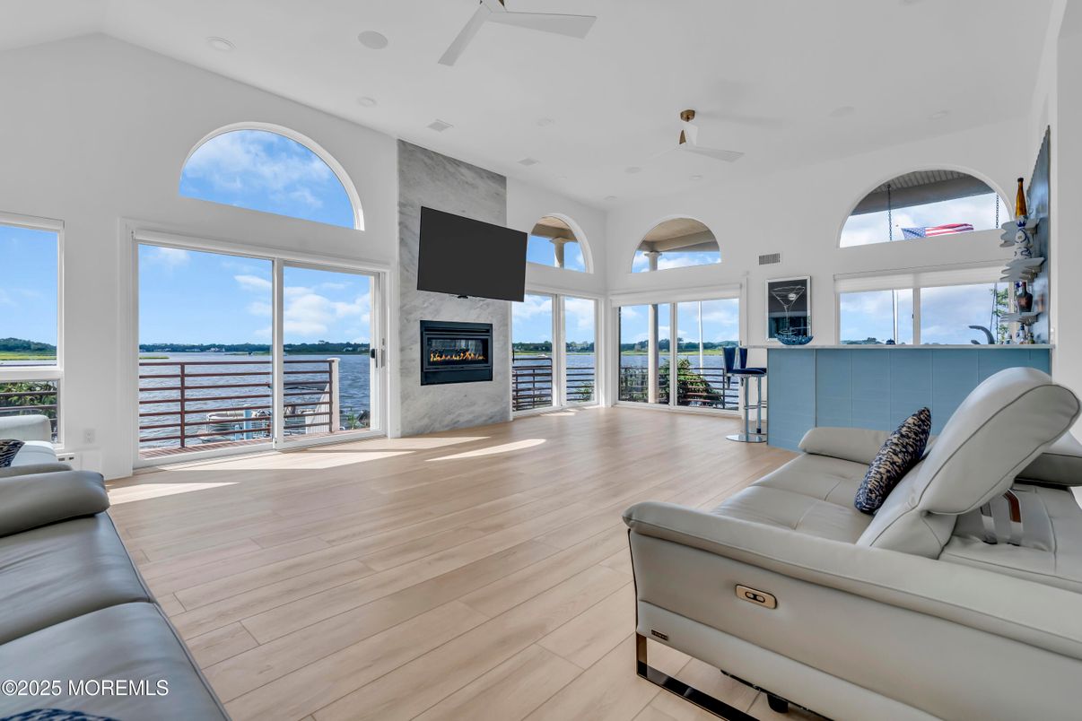 Fireplace, Interior, Recessed Lighting, Water, Wood Texture Flooring