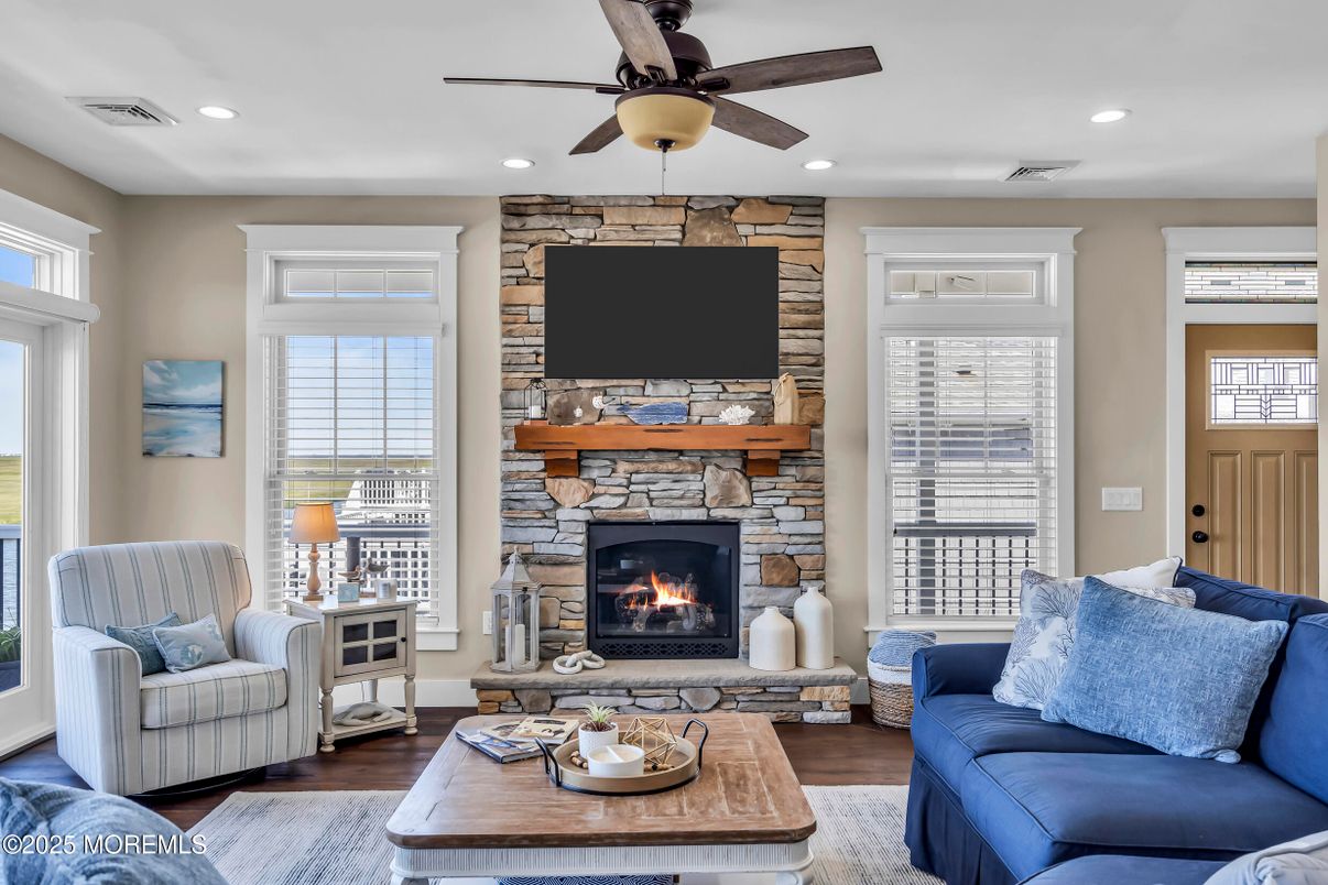 Fireplace, Interior, Living room, Recessed Lighting, Stone Walls, Wood Texture Flooring