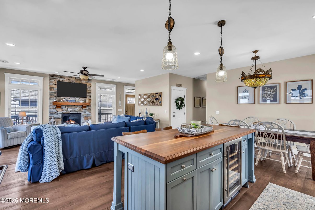 Dining room, Fireplace, Interior, Kitchen, Living room, Pendant Lights, Recessed Lighting, Stone Walls, Wood Texture Flooring