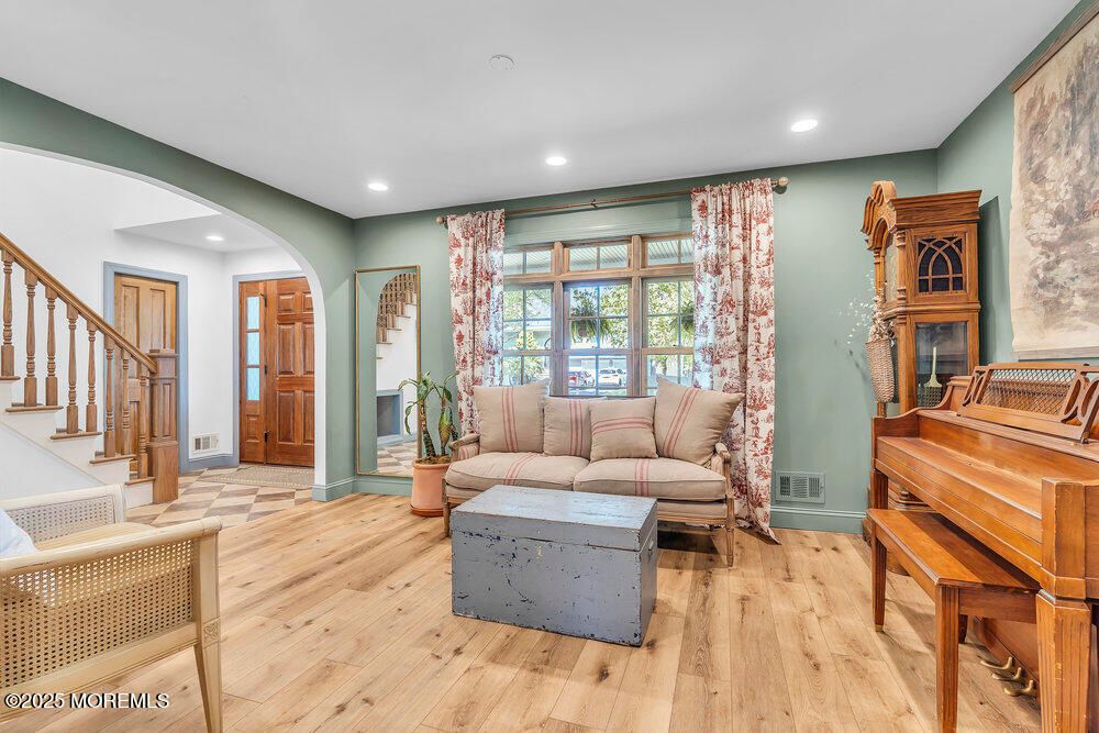 Fireplace, Interior, Living room, Piano, Recessed Lighting, Wood Texture Flooring