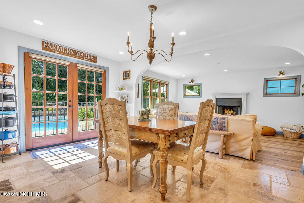 Chandelier, Dining room, Fireplace, Interior, Recessed Lighting