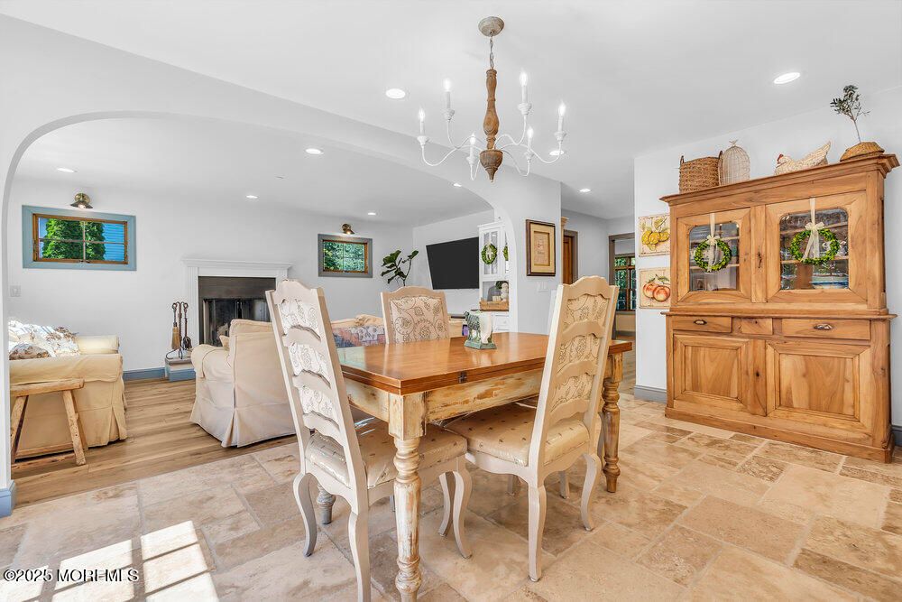 Chandelier, Dining room, Fireplace, Interior, Recessed Lighting, Wood Texture Flooring