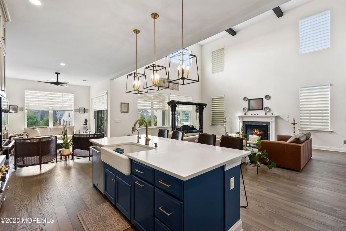 Chandelier, Dining room, Fireplace, Interior, Kitchen, Living room, Pendant Lights, Recessed Lighting, Wood Texture Flooring