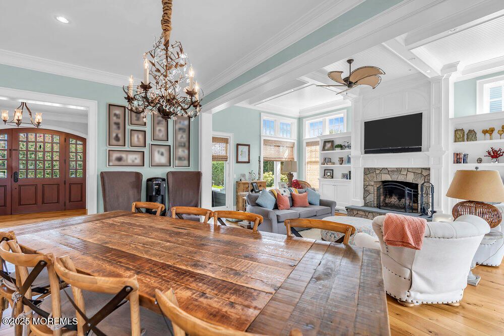 Chandelier, Dining room, Fireplace, Interior, Living room, Recessed Lighting, Wood Texture Flooring