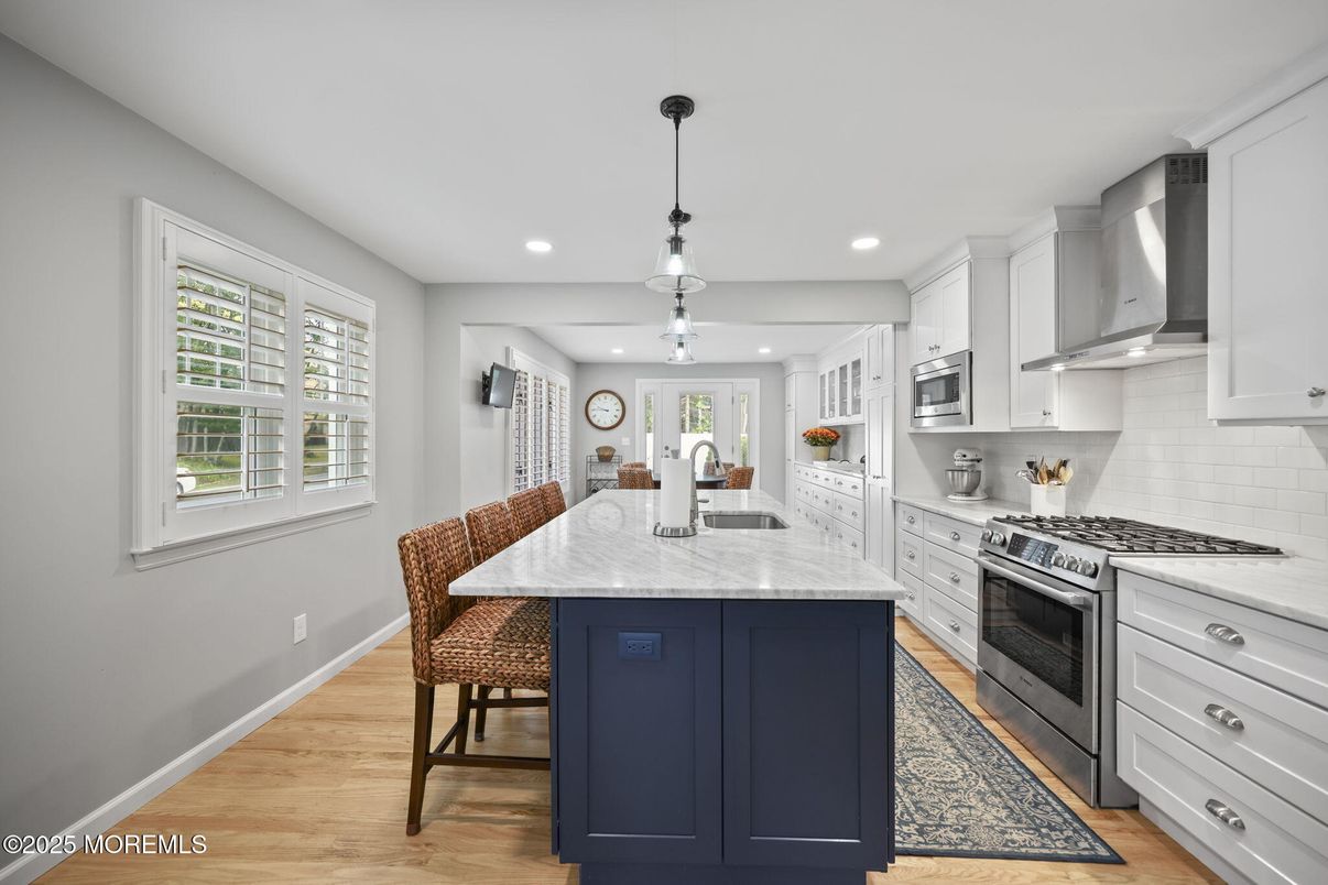 Dining room, Interior, Kitchen, Pendant Lights, Recessed Lighting, Stainless Steel Appliances, Wood Texture Flooring