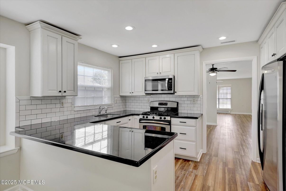 Interior, Kitchen, Recessed Lighting, Stainless Steel Appliances, Wood Texture Flooring