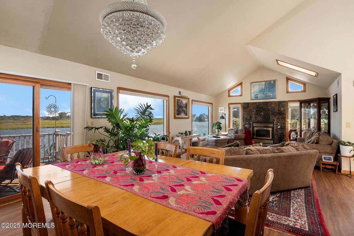 Dining room, Fireplace, Interior, Living room, Water, Wood Texture Flooring