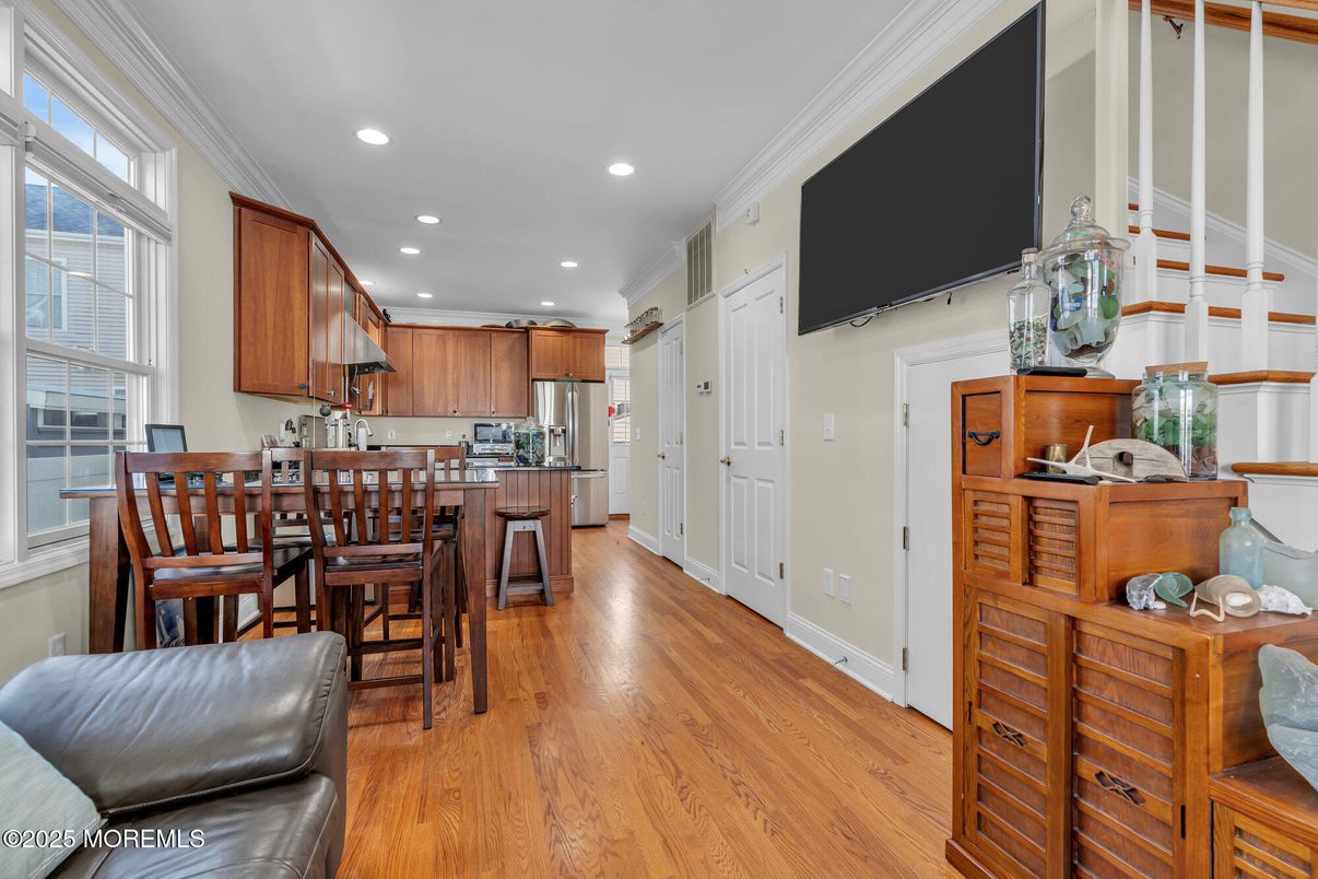 Dining room, Interior, Kitchen, Recessed Lighting, Stainless Steel Appliances, Wood Texture Flooring