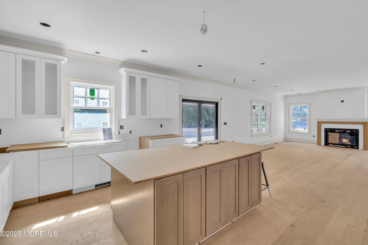 Fireplace, Interior, Kitchen, Recessed Lighting, Wood Texture Flooring