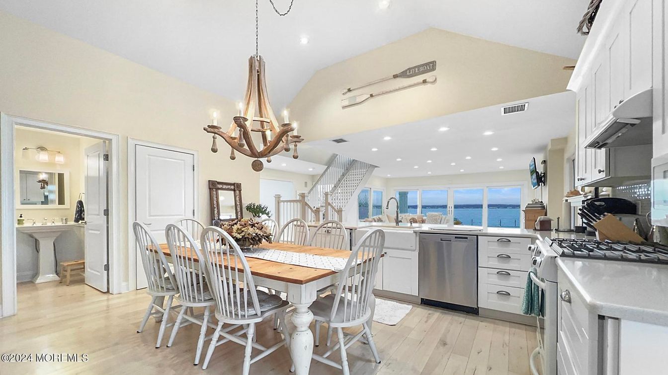 Chandelier, Dining room, Interior, Kitchen, Recessed Lighting, Stainless Steel Appliances, Water, Wood Texture Flooring