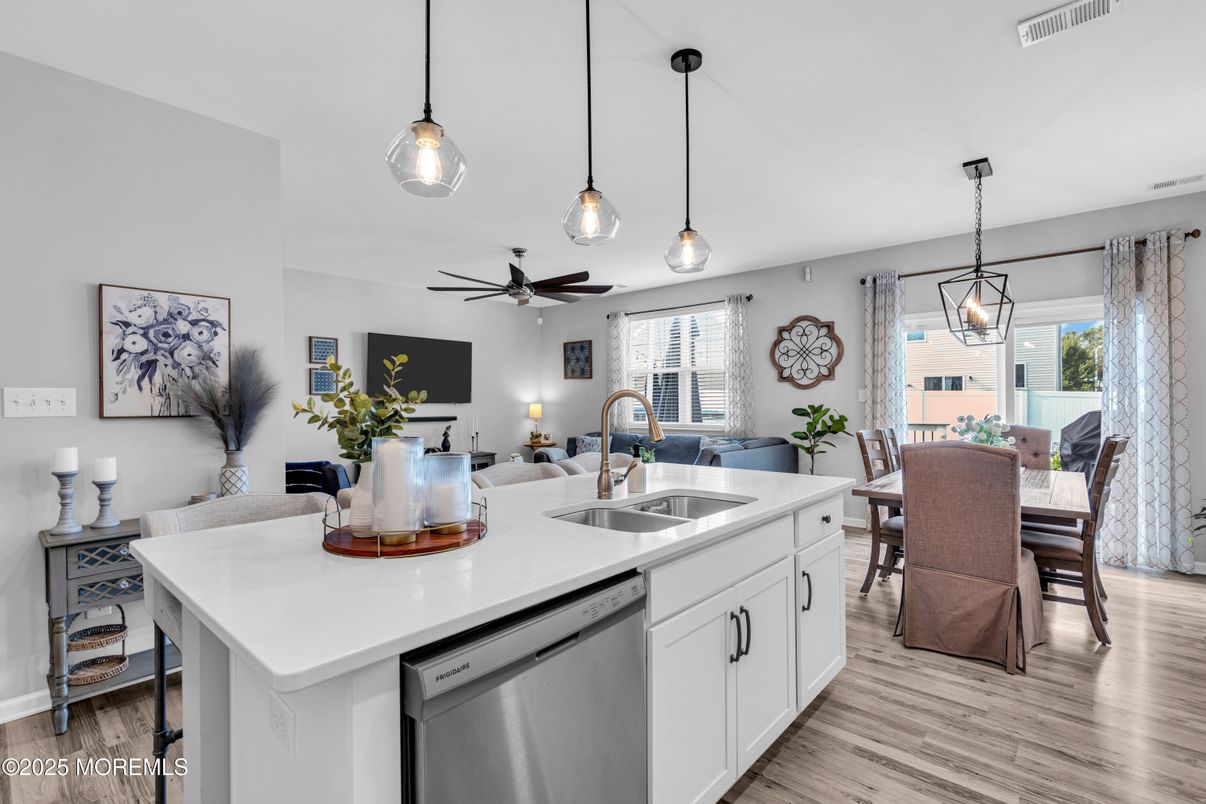 Dining room, Interior, Kitchen, Pendant Lights, Stainless Steel Appliances, Wood Texture Flooring