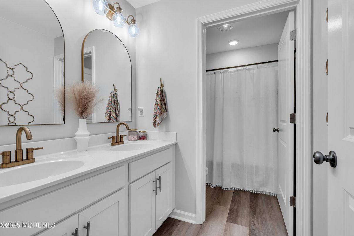 Bathroom, Dual Sink Vanities, Interior, Recessed Lighting, Wood Texture Flooring