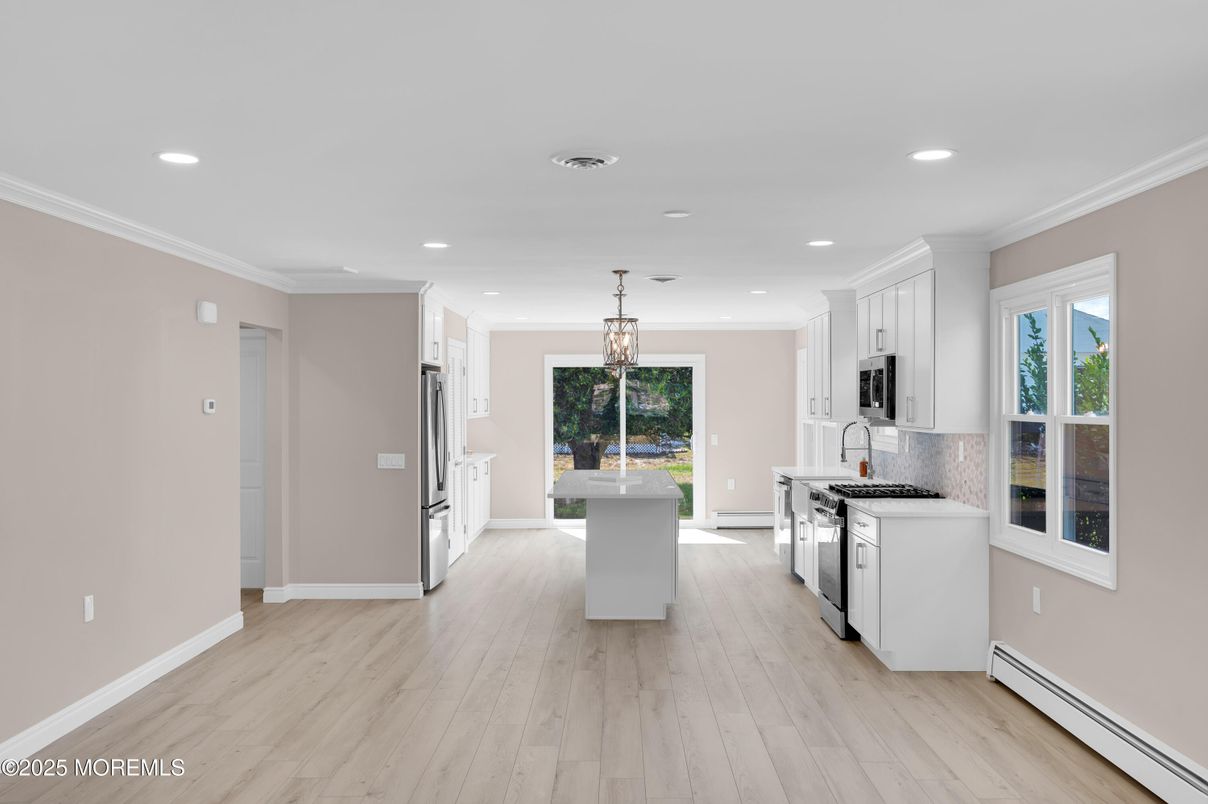 Interior, Kitchen, Pendant Lights, Recessed Lighting, Stainless Steel Appliances, Wood Texture Flooring