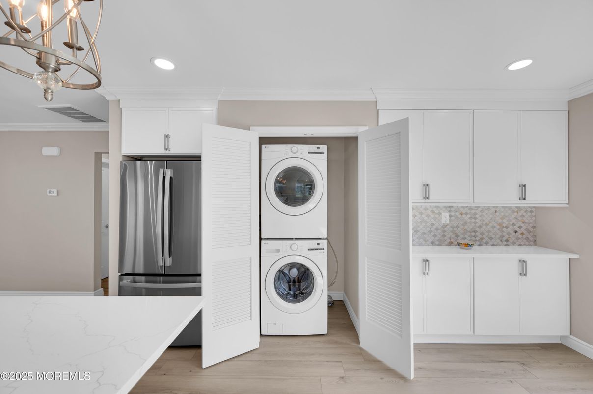 Interior, Kitchen, Recessed Lighting, Utility Closets, Washer, Wood Texture Flooring