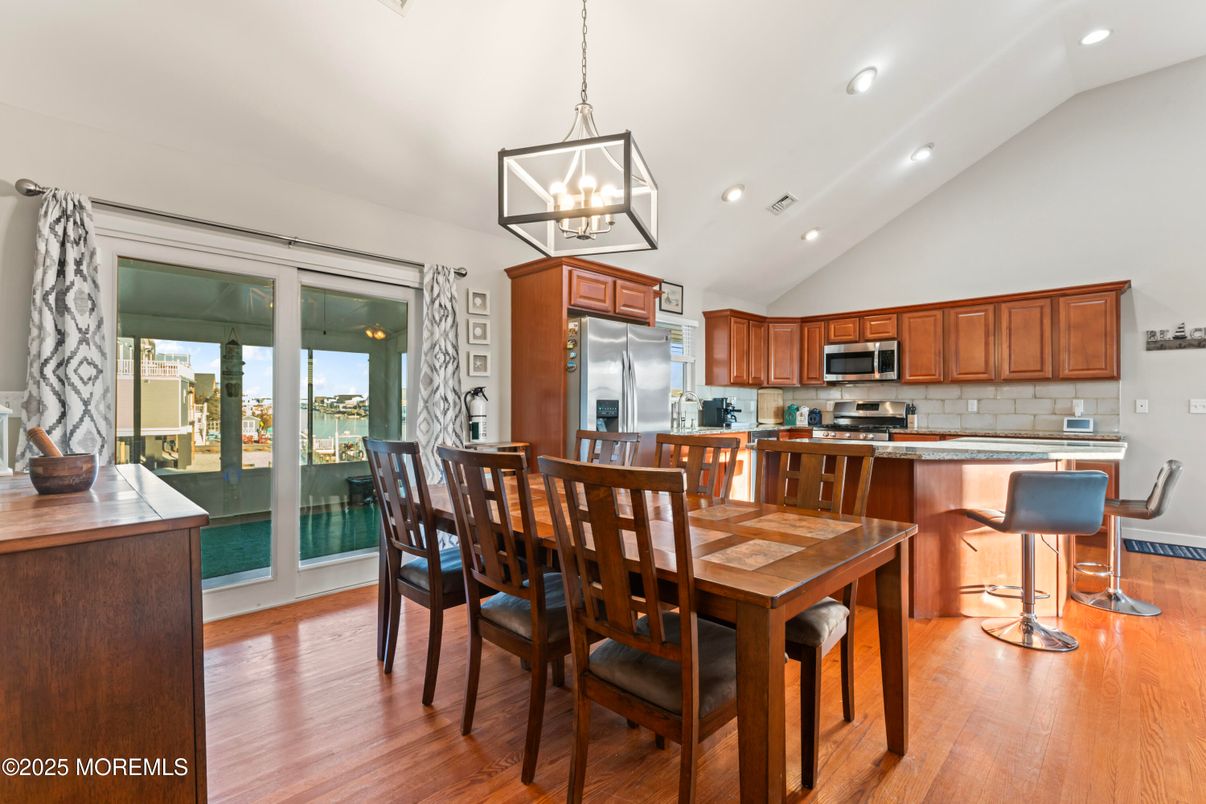 Dining room, Interior, Kitchen, Pendant Lights, Recessed Lighting, Stainless Steel Appliances, Wood Texture Flooring
