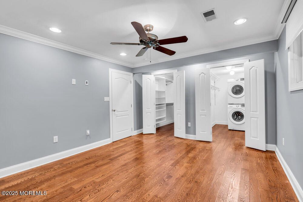 Empty room, Interior, Recessed Lighting, Utility Closets, Washer, Wood Texture Flooring