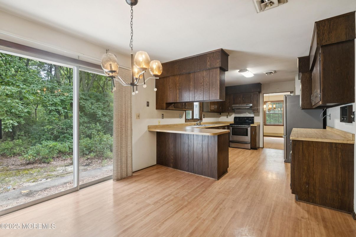 Interior, Kitchen, Pendant Lights, Stainless Steel Appliances, Wood Texture Flooring
