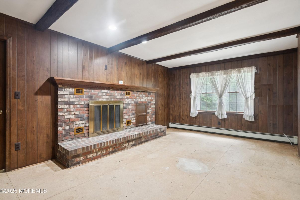 Empty room, Fireplace, Interior, Recessed Lighting, Stone Walls, Wooden Beams, Wooden Walls