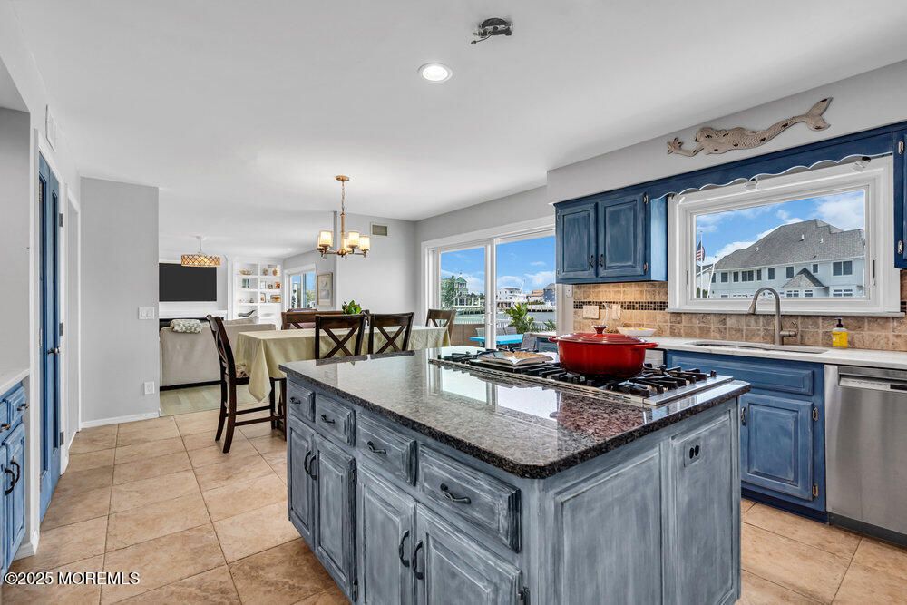 Chandelier, Dining room, Interior, Kitchen, Recessed Lighting, Stainless Steel Appliances