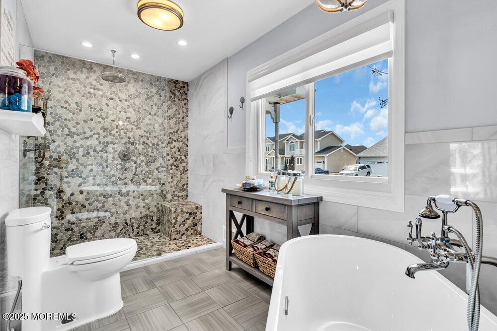 Bathroom, Free Standing Baths, Glass Shower, Interior, Marble Walls, Recessed Lighting