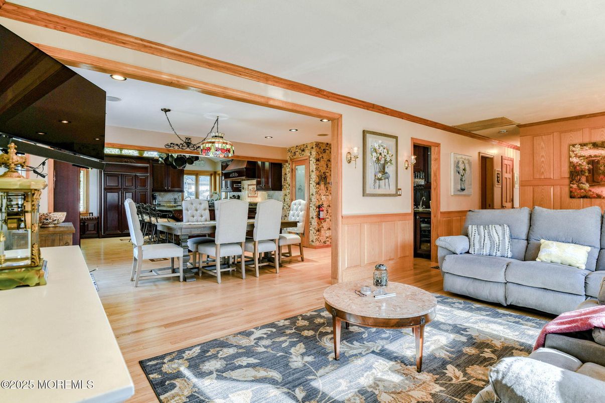 Chandelier, Dining room, Interior, Kitchen, Living room, Pendant Lights, Recessed Lighting, Wood Texture Flooring