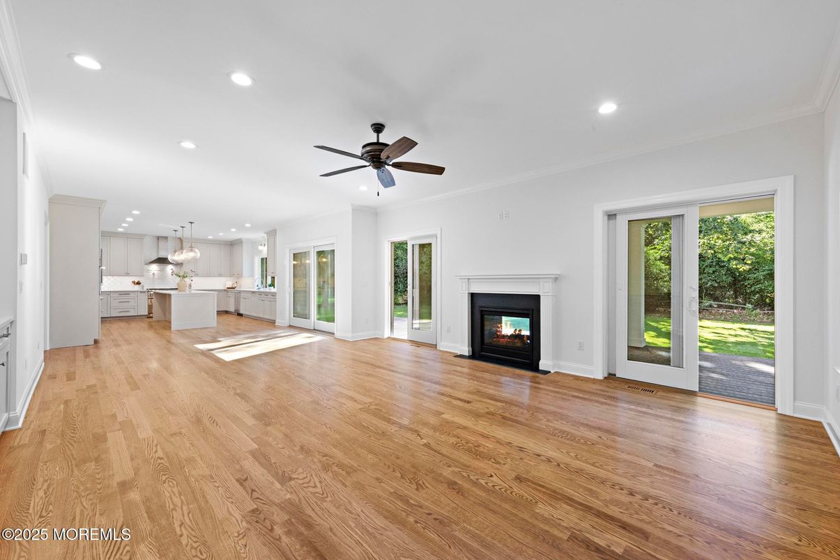 Empty room, Fireplace, Interior, Kitchen, Pendant Lights, Recessed Lighting, Wood Texture Flooring