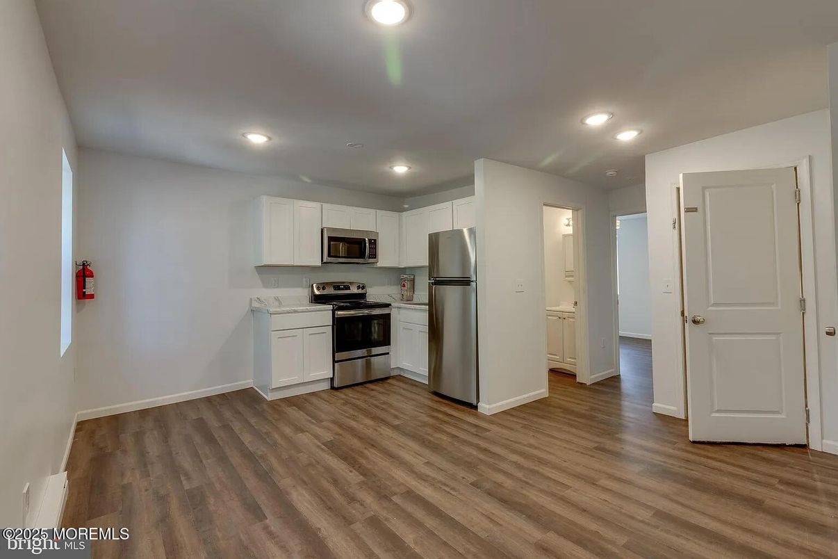 Interior, Kitchen, Recessed Lighting, Stainless Steel Appliances, Wood Texture Flooring