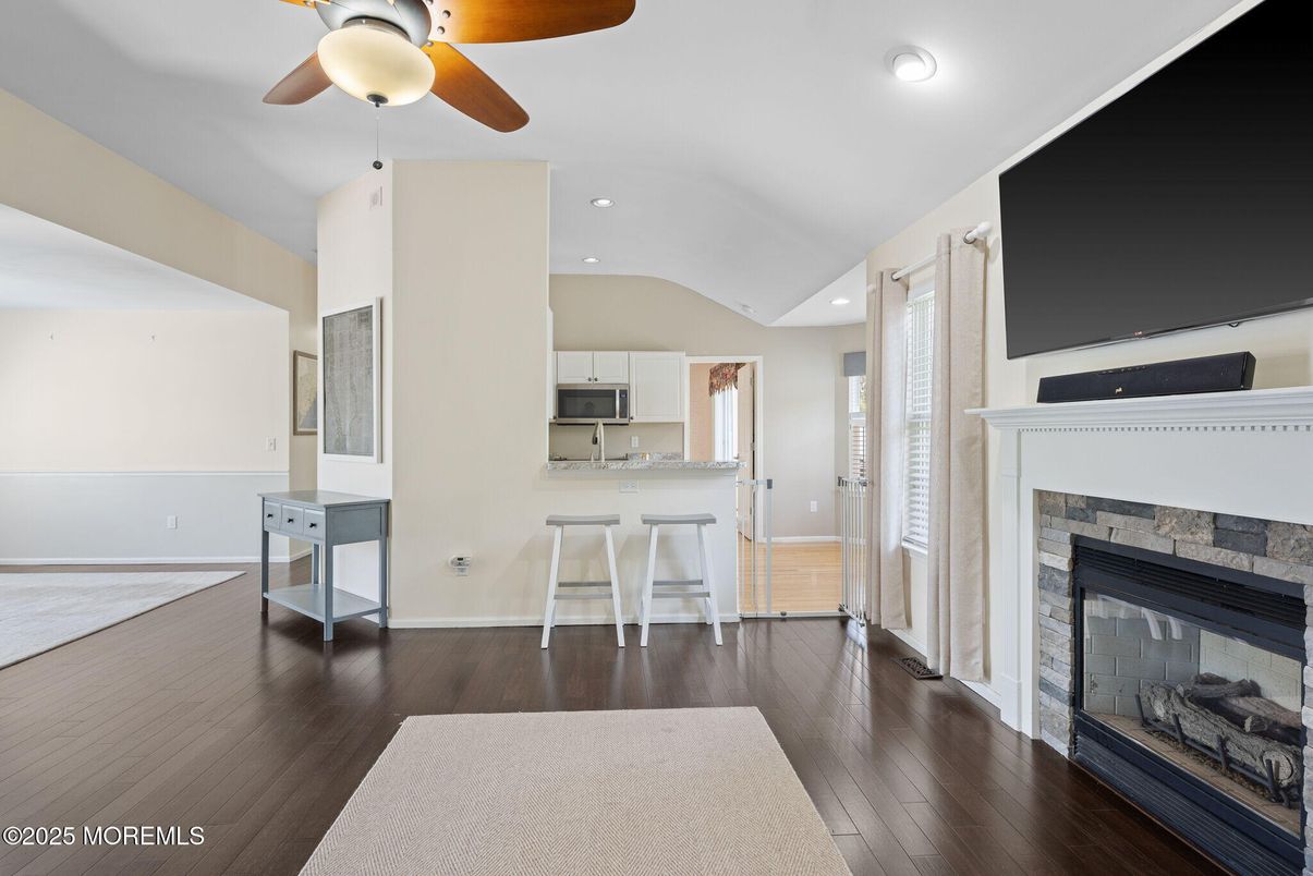 Fireplace, Interior, Kitchen, Recessed Lighting, Wood Texture Flooring