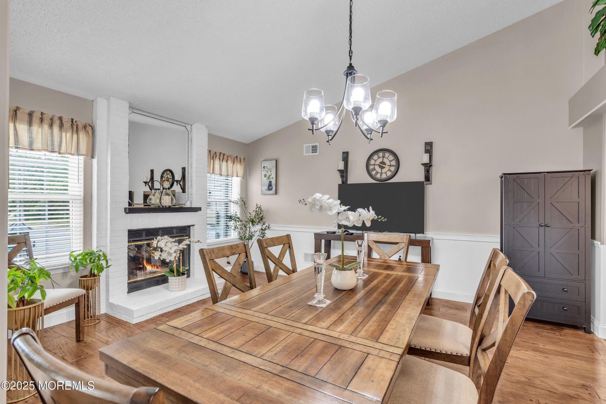 Chandelier, Dining room, Fireplace, Interior, Wood Texture Flooring
