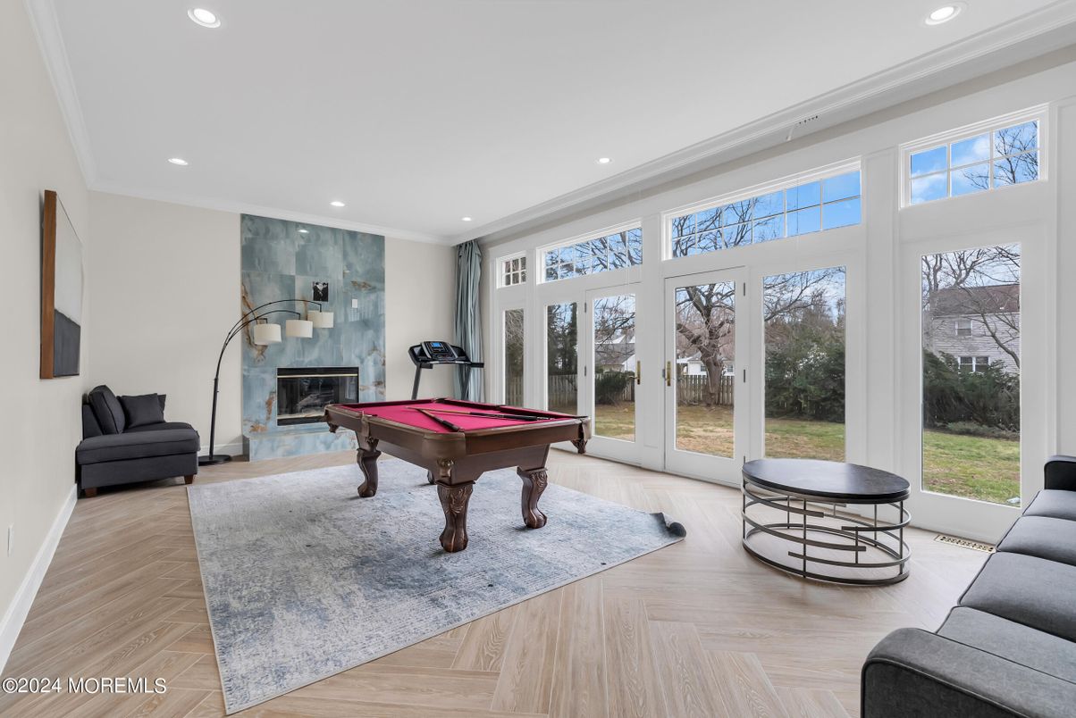 Billiard Table, Fireplace, Game Room, Interior, Recessed Lighting, Wood Texture Flooring