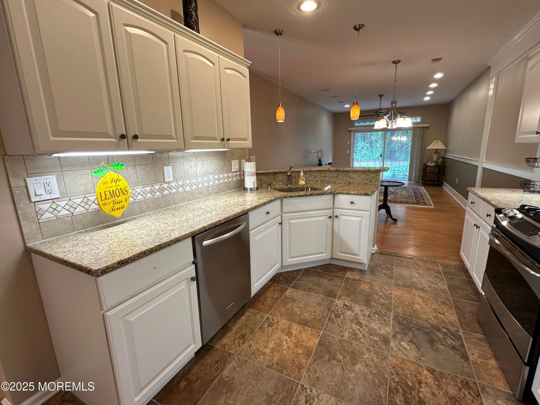 Dining room, Interior, Kitchen, Pendant Lights, Recessed Lighting, Stainless Steel Appliances, Wood Texture Flooring