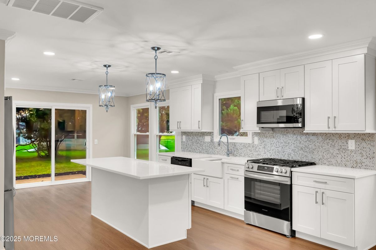 Interior, Kitchen, Pendant Lights, Recessed Lighting, Stainless Steel Appliances, Wood Texture Flooring