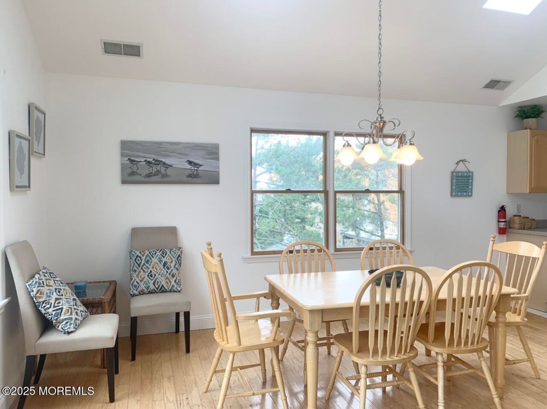 Chandelier, Dining room, Interior, Pendant Lights, Wood Texture Flooring