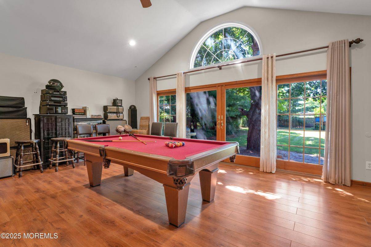 Billiard Table, Fireplace, Game Room, Interior, Recessed Lighting, Wood Texture Flooring