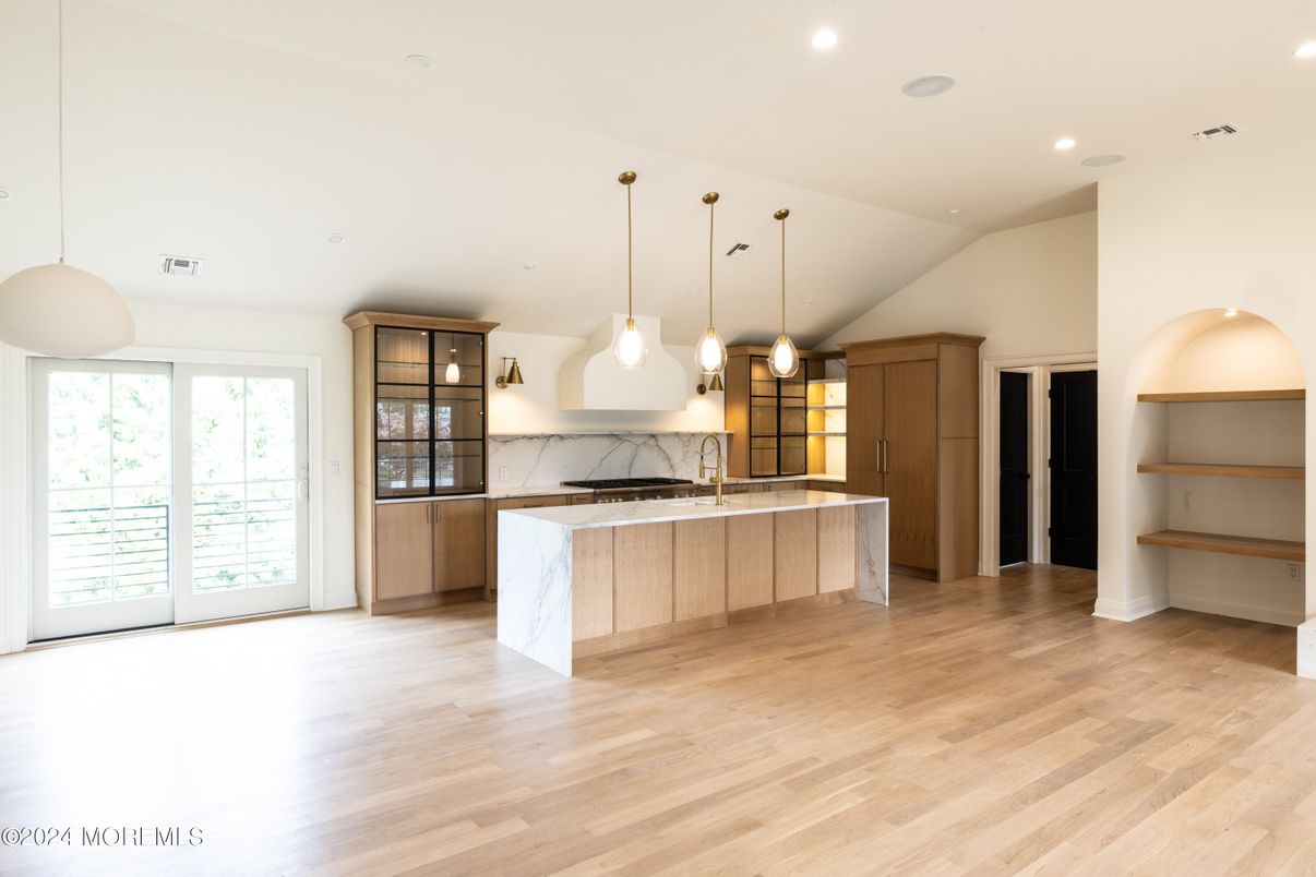 Interior, Kitchen, Marble Walls, Pendant Lights, Recessed Lighting, Wood Texture Flooring