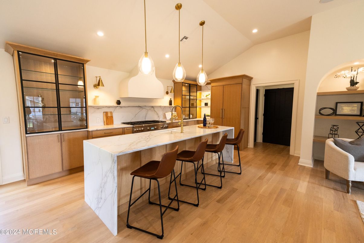 Interior, Kitchen, Marble Walls, Pendant Lights, Recessed Lighting, Wood Texture Flooring