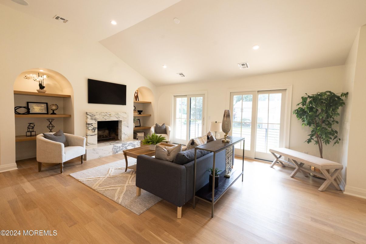 Fireplace, Interior, Living room, Recessed Lighting, Wood Texture Flooring